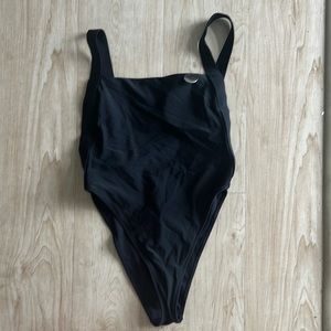 All black deep side cut one piece. It's giving SEXY!